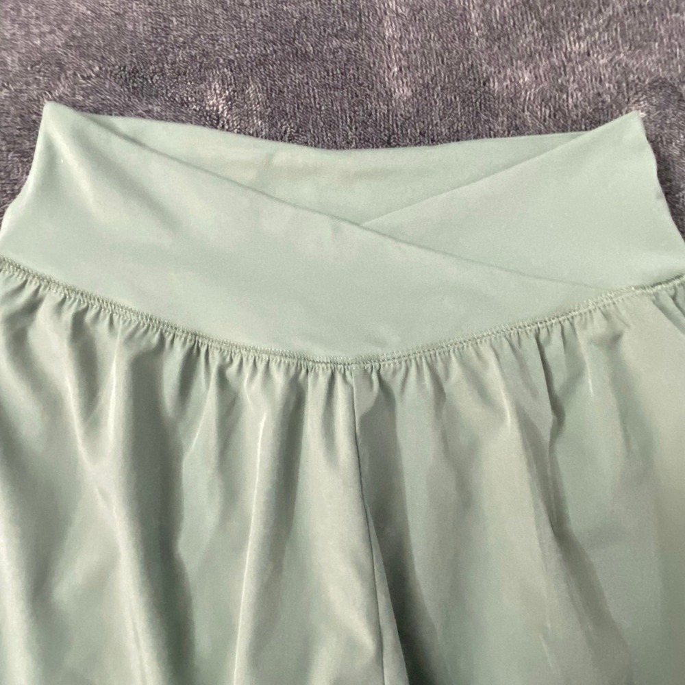 Sage green Seeking Sunset flowy short with crossover waistband